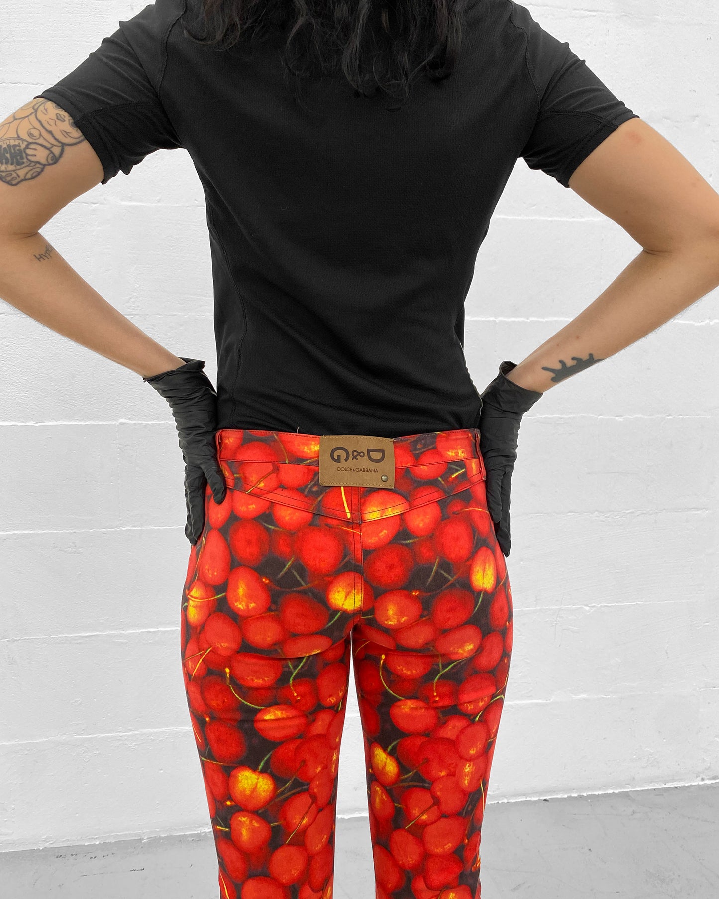 Dolce & Gabbana 2000s Cherry All Over Print Flared Pants Red