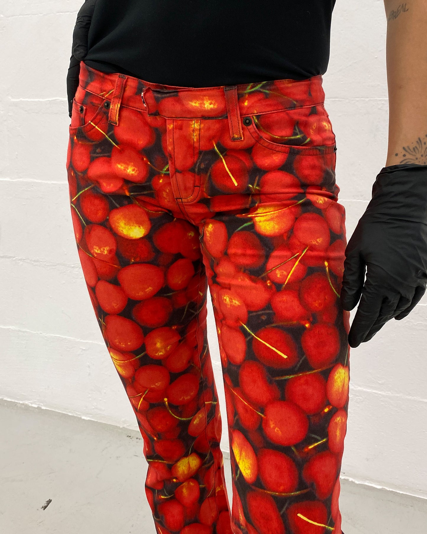Dolce & Gabbana 2000s Cherry All Over Print Flared Pants Red