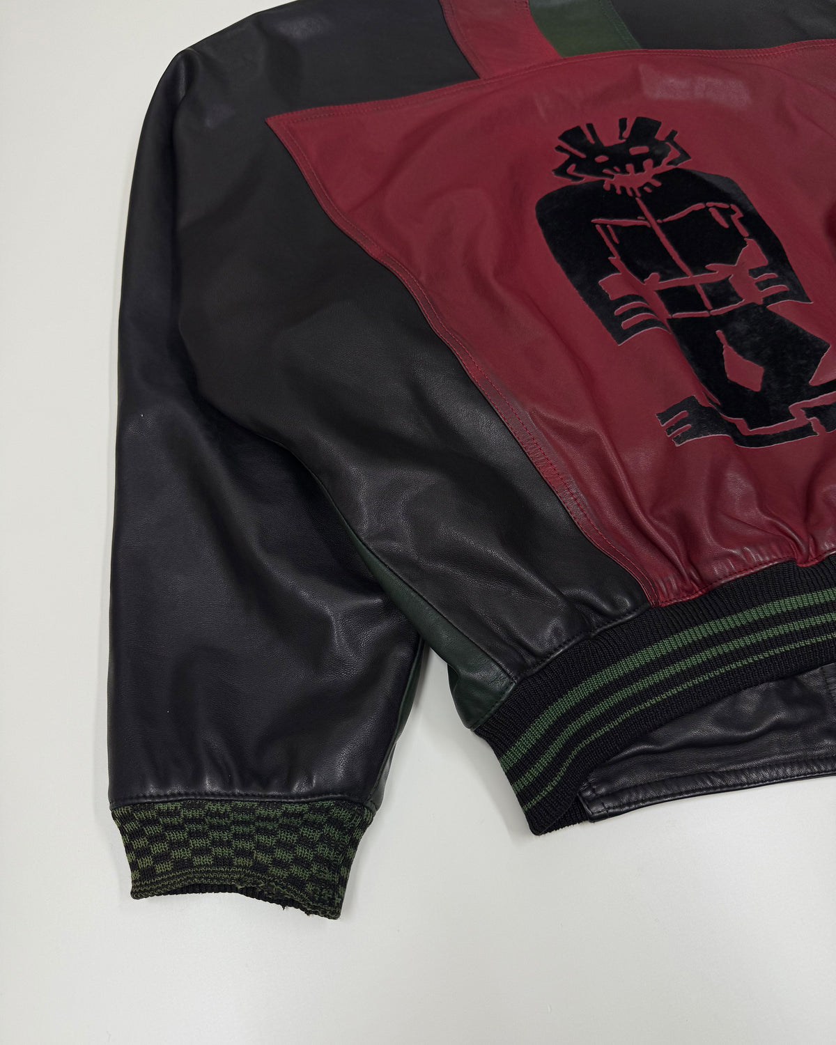 Marithé + François Girbaud x Compagnie des Montagnes et des Forets 1980s Millesimes Pre-Columbian Figure Leather Bomber Jacket Black Red Green