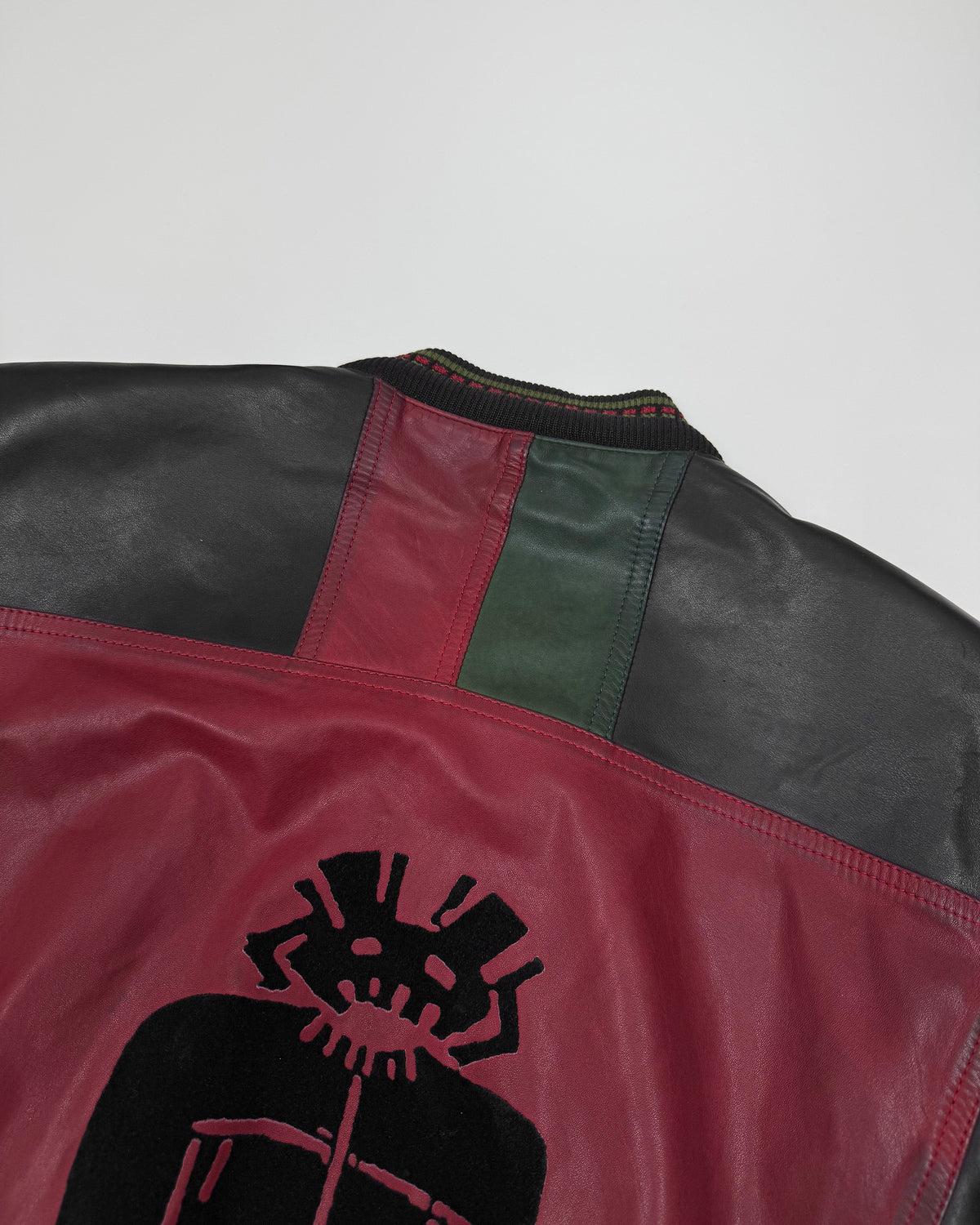 Marithé + François Girbaud x Compagnie des Montagnes et des Forets 1980s Millesimes Pre-Columbian Figure Leather Bomber Jacket Black Red Green