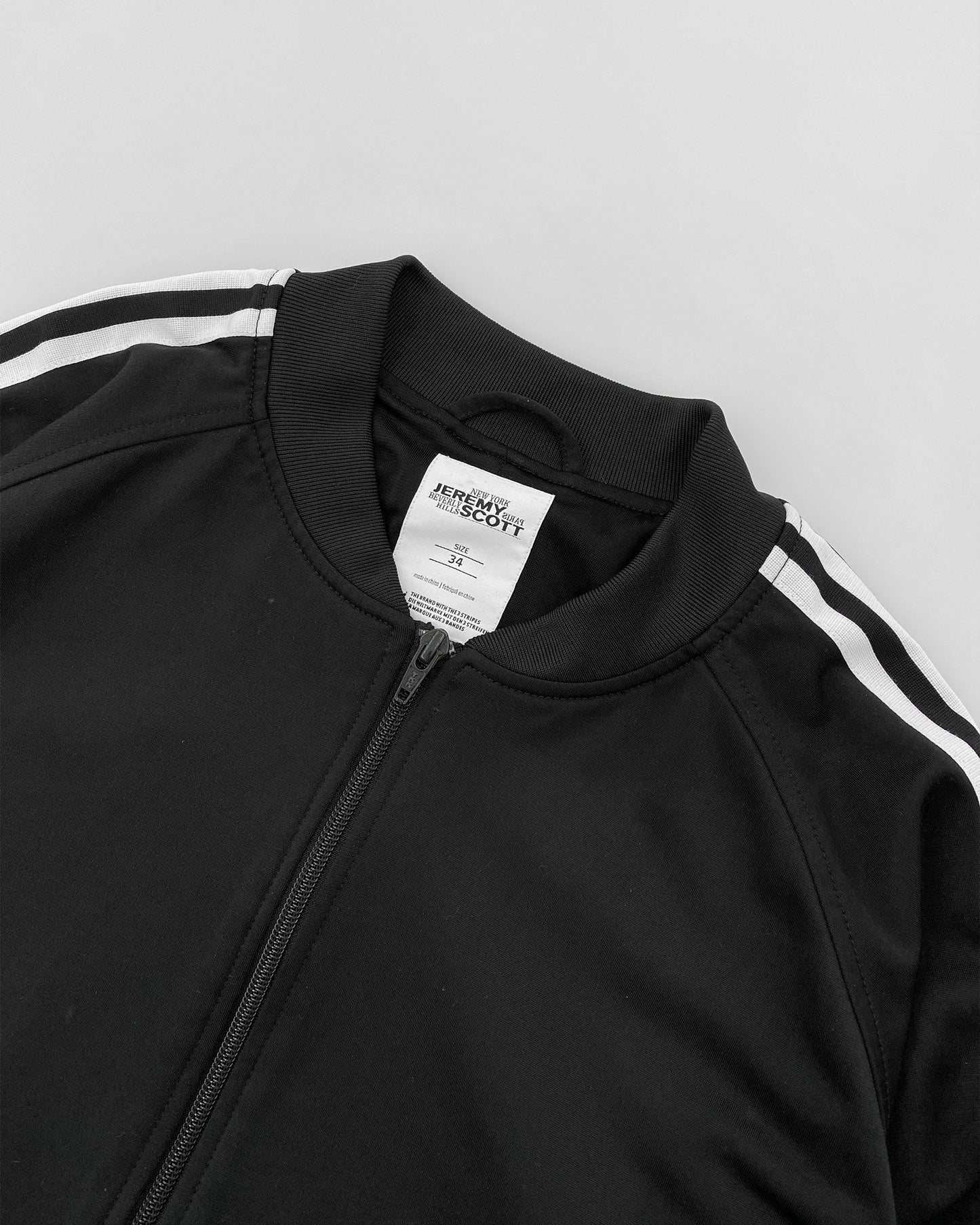 Jeremy Scott x Adidas 2010er Trainingsjacke mit offenem Rücken, Schwarz 