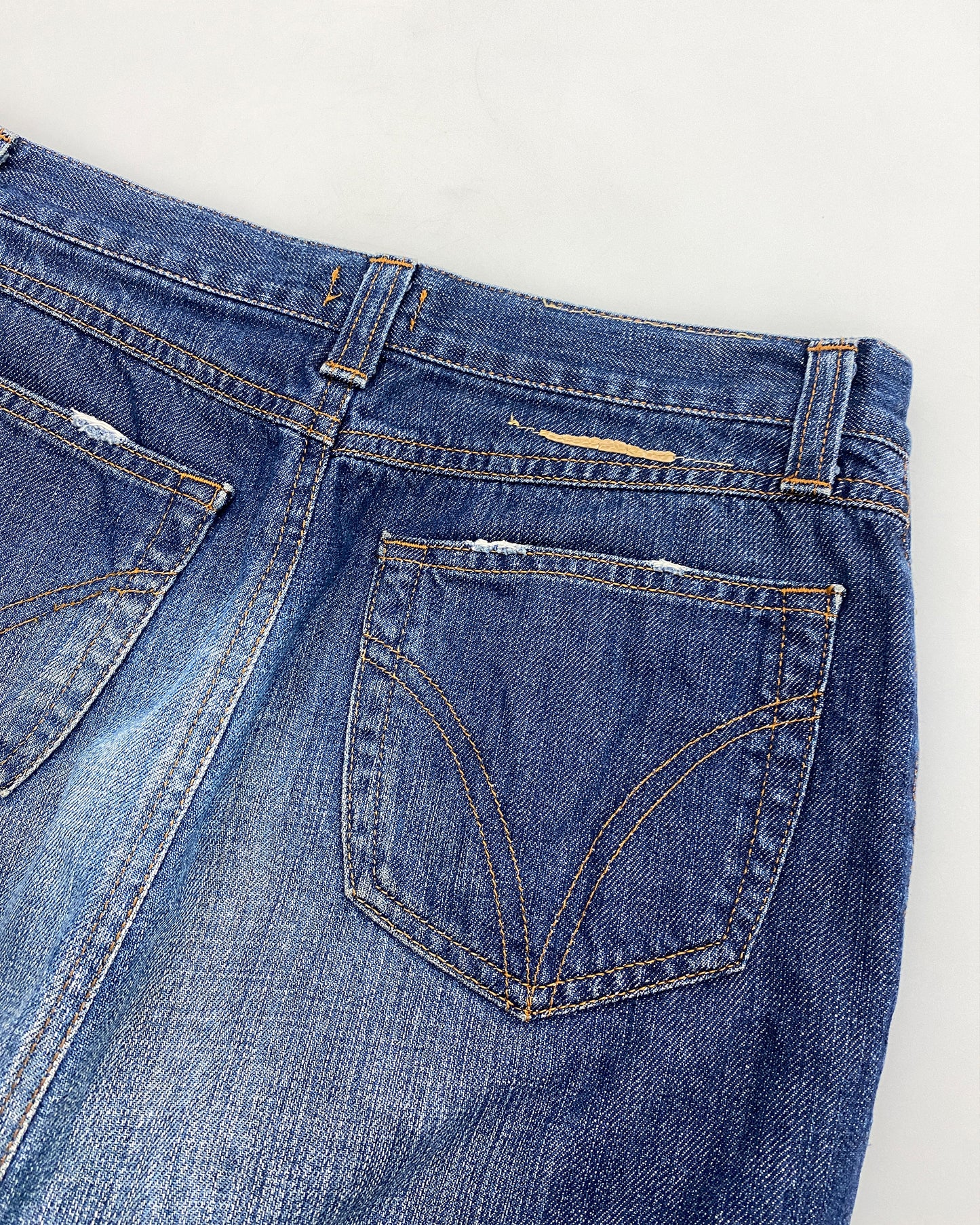 Dolce &amp; Gabbana 2000s Denim-Midirock in verwaschenem Blau 